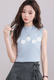 Blue Sleeveless Top with White Flower Embellishments