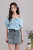 Blue Ruffled Blouse with Decorative Ring