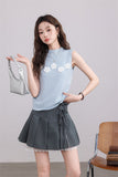 Blue Sleeveless Top with White Flower Embellishments