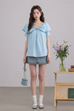 Blue Ruffled Blouse with Decorative Ring